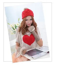 Women's long knitted arm warmers featuring plush faux fur trim and fingerless design