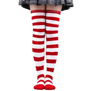 Vibrant red and white striped thigh-high socks for Christmas and festive costumes
