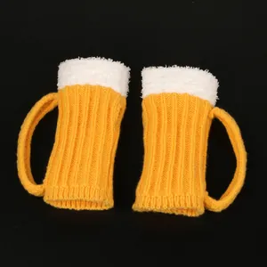Creative beer mug design knit fingerless gloves with a soft fuzzy white foam trim.