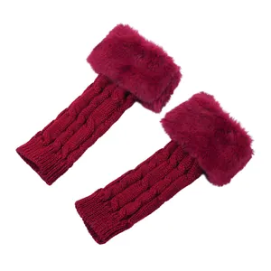 Detail view of burgundy cable knit arm warmers with soft faux fur trim for winter