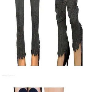 Detail view of dark grey knitted leg warmers with wavy edges for yoga and ballet