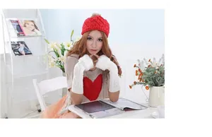 White faux fur fingerless long arm warmers for women featuring elegant knit diamond texture