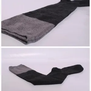 Chaussettes hautes tricotées bicolores gris et noir pour femmes automne et hiver