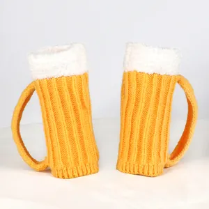 Detail view of 3D beer mug knitted gloves with plush white foam top for winter