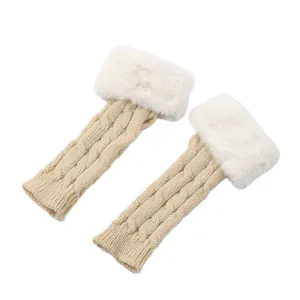 Detailed view of women's beige cable knit arm warmers featuring soft white faux fur trim