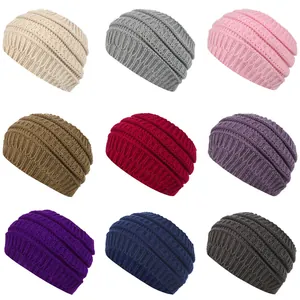 Collection of widened knitted headbands in nine different autumn and winter colors