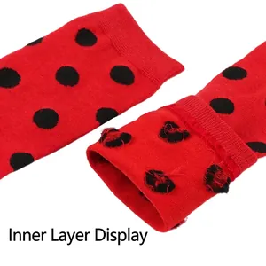 Macro view showing the high-quality inner lining of red ladybug polka dot socks
