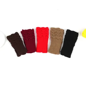 Collection of knitted fingerless arm warmers with heart hollow patterns in five colors