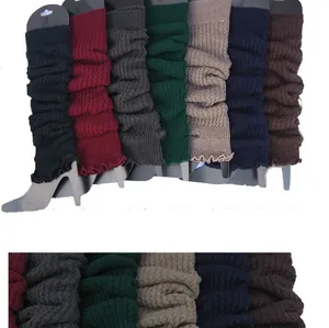 Close-up of multicolored knitted yoga leg warmers featuring soft ribbed fabric texture