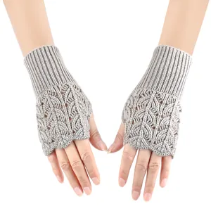Grey knitted fingerless gloves with heart hollow-out pattern for winter warmth