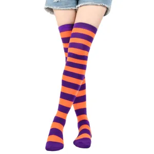 Detailed view of vibrant purple and orange striped over-the-knee socks for cosplay outfits