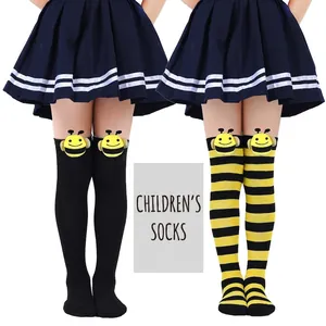 Adorable children's over-the-knee socks featuring cute bee dolls in black and striped styles