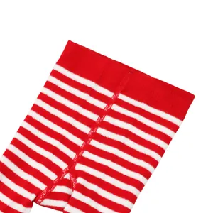 Close-up detail of red and white striped baby tights showing high-quality seams