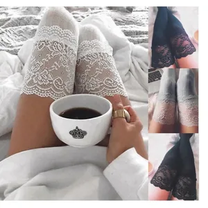 Detail view of lace trim on cozy knit over-the-knee thigh-high socks for women