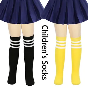Pack of children's striped knee-high socks featuring black and yellow styles with white bands