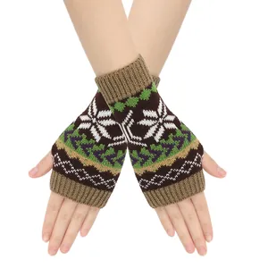 Close-up detail of colorful snowflake pattern knitted fingerless gloves for winter