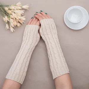 Long cream cable knit fingerless arm warmers for winter warmth