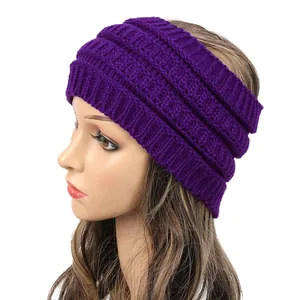 Detailed side view of a purple cable knit wide headband worn on a mannequin head