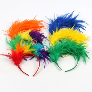 Close-up detail showing the vibrant colors and fluffy texture of the festive feather headbands.