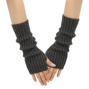 Detailed view of dark grey knitted fingerless arm warmers with a slouchy ribbed texture