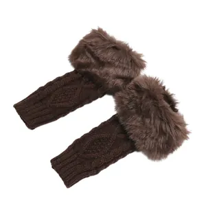Close-up detail of brown cable knit fingerless gloves featuring soft faux fur trim