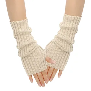 Detailed view of beige ribbed knitted fingerless gloves showing texture on hands