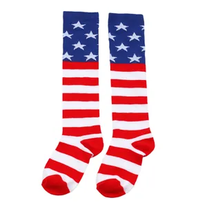 Detail view of US flag pattern knee-high socks for kids' Independence Day celebrations.