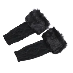Detailed view of black knitted fingerless gloves with soft faux fur trim for winter