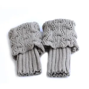 Pair of short grey knitted boot cuffs with elegant openwork pattern and ribbed design