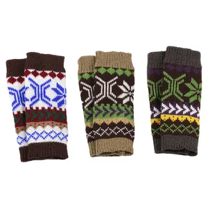 Detailed view of colorful knitted fingerless arm warmers with snowflake patterns