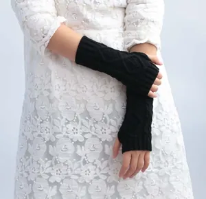 Warm black cable knit fingerless gloves arm warmers for women's winter fashion accessory