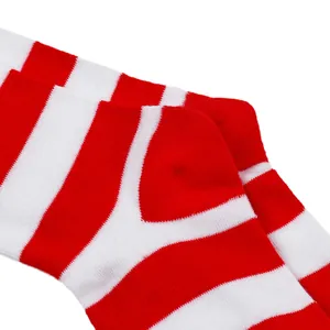 Close-up of red and white striped heel detail on children's Independence Day socks.