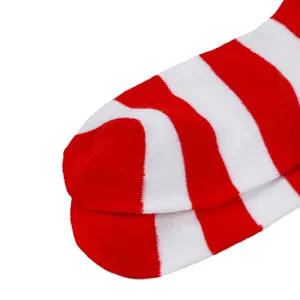 Detailed macro view of red and white striped knit socks for children with soft texture
