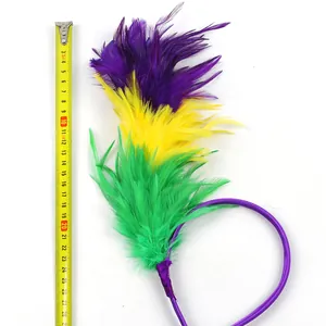 Detailed view of colorful feather headband with ruler showing height for Mardi Gras