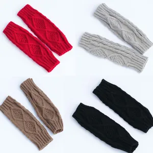 Detail view of cable-knit fingerless arm warmers in four classic colors for warmth