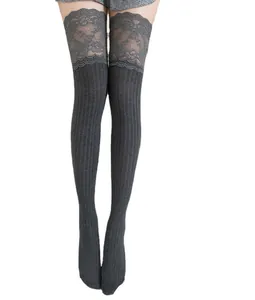 Elegant grey over-the-knee socks with delicate lace trim and ribbed knit texture