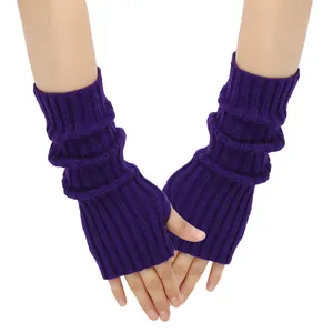 Detail view of purple knitted fingerless gloves showing ribbed texture on hands