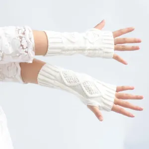 Warm white cable knit fingerless gloves and arm warmers for women's winter fashion style