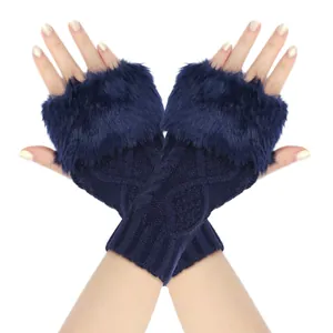 Close-up of navy blue knit fingerless gloves with faux fur trim and diamond pattern
