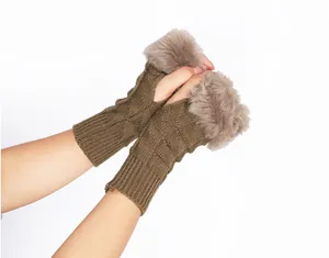 Warm knitted fingerless gloves with soft faux fur trim for autumn and winter.