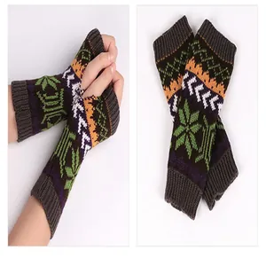 Winter knit fingerless gloves with colorful snowflake pattern and warm arm sleeve design.