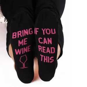 Funny black cotton socks featuring pink Bring Me Wine If You Can Read This lettering