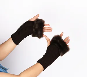 Close-up view of dark brown fingerless knit gloves featuring soft faux rabbit fur trim details