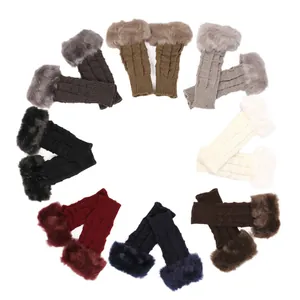 Assorted colors of soft winter knitted fingerless gloves with faux rabbit fur trim.