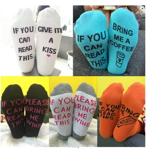 Collection of novelty cotton short socks featuring funny English phrases printed on soles.