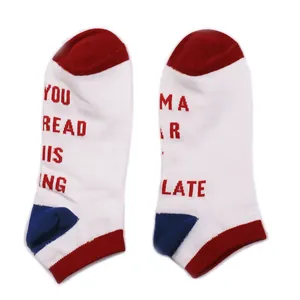 Detail of 'If You Can Read This' funny novelty ankle socks in red and white