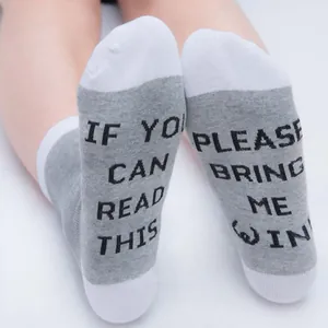 Unisex funny cotton mid-tube socks featuring 'Bring Me Wine' printed letters on bottom