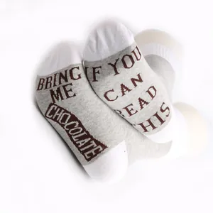 Novelty cotton socks featuring 'If You Can Read This Bring Me Chocolate' text on the soles