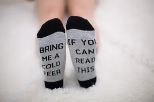 Funny "Bring Me a Cold Beer" novelty socks in gray and black cotton blend