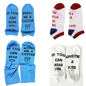 Detailed view of novelty cotton socks featuring humorous English slogans on soles.